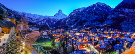 Beautiful view of old village in twilight time with Matterhorn peak background in Zermatt, Switzerland.の写真素材