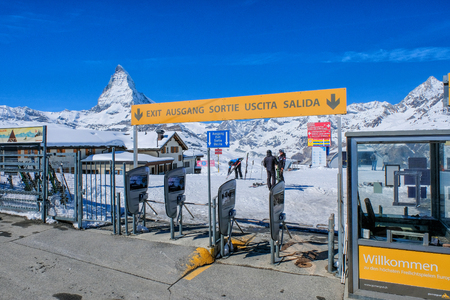 Zermatt, Switzerland- MARCH 28, 2017: skiing with zermatt staion as background in winter season.The Matterhorn is a mountain of the Alpsのeditorial素材