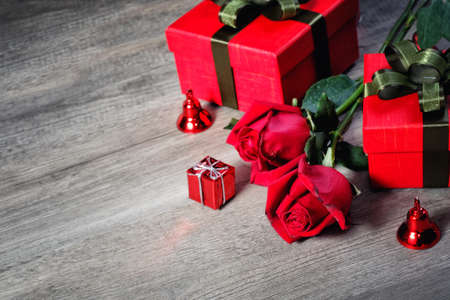 Happy Valentine's Day Concept with red roses, gift boxes and space for textの写真素材