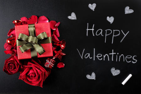 Happy Valentine's Day Concept with red roses, gift boxes and space for textの写真素材