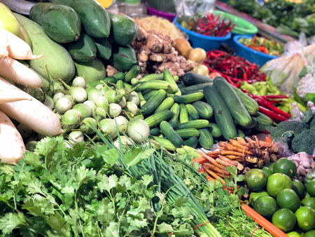 Fresh fruit and in vegetable shop on street market, Thailandの写真素材