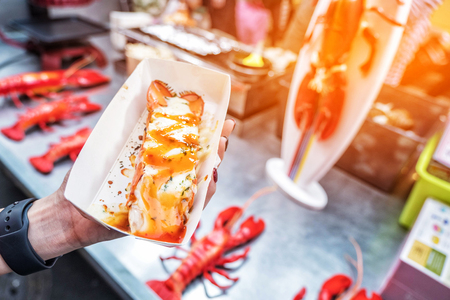 Roasted lobster with cheese at Myeong-dong street food in Seoul, South Koreaの写真素材