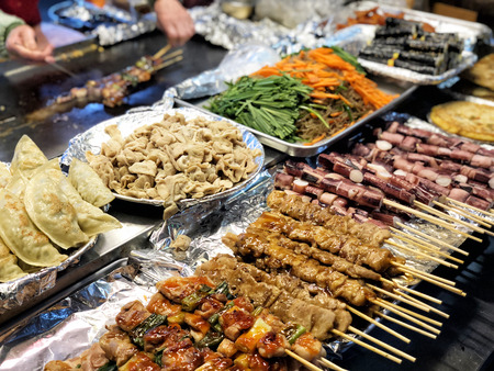 Street food at Dongdaemun district nightlife in Seoul, Koreaの写真素材