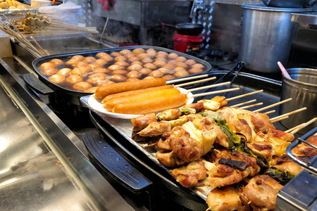 Street food at Dongdaemun district nightlife in Seoul, Koreaの写真素材