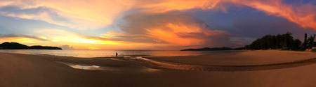 Panoramic view of sunset at Karon beach in Phuket, Thailandの写真素材