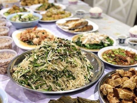 Chinese Ghost Festival. Sacrificial offering food for pray to god and memorial to ancestorの写真素材