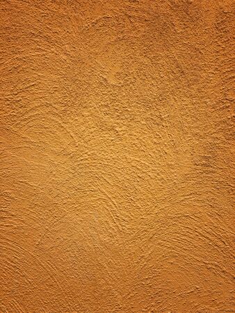 Orange cement wall detail and texture.の写真素材