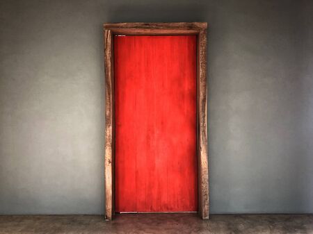 Vintage old red wood door の写真素材
