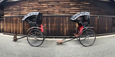 Ancient Japanese Tricycles at shopping street in takayama, Japanの写真素材