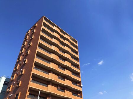 vintage apartment buildings exteriors in daylightの写真素材