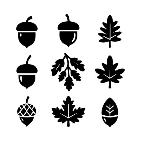 autumn leaves and acorns icon set over white background, silhouette style, vector illustrationのイラスト素材