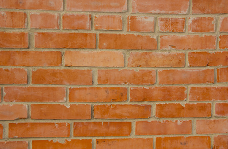 The texture of the brick is red. Background of empty brick basement wallの写真素材