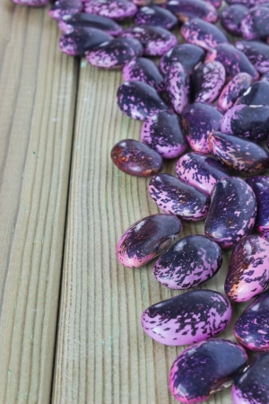 bright purple beans scattered on the table