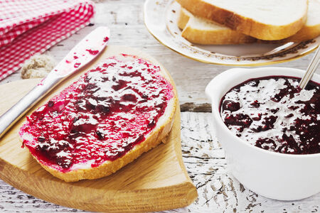 currant jam and bread on the table