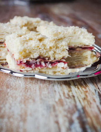 cake from flaky pastry with cranberry stuffingの写真素材