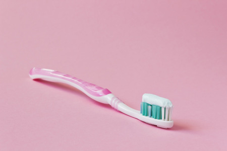 toothbrush on a colored background. care and caring for your teeth. copy space background