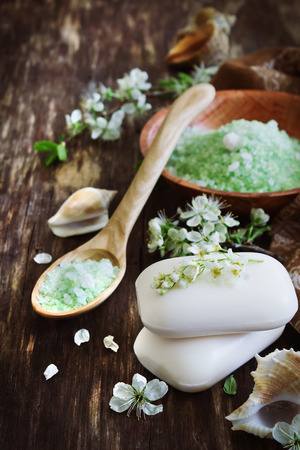 aromatic soap and salt on the old wooden background. aromatherapy spa conceptの写真素材