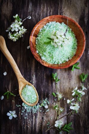 bath salt on a rustic wooden background.aromatherapy spa conceptの写真素材