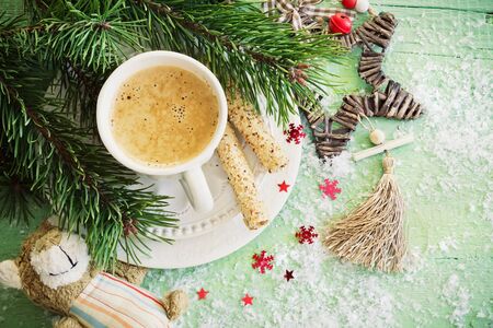 cup with coffee and cookies on the christmas table. christmas ideas. top view. image is tintedの写真素材
