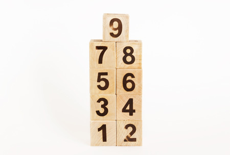 wooden cubes for the training and development of the child on a white background. child development conceptの写真素材