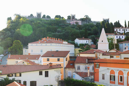 Scenic view of red roofs of the historical center of old town Piran with Tartini Square against the...