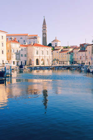 Scenic view of red roofs of the historical center of old town Piran with Tartini Square against the...