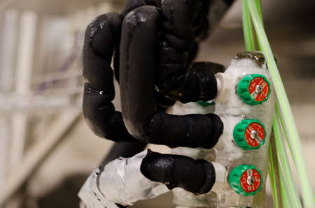 Splice electrical wiring using wire connectors. Wire harnesses with plastic connectors at beer plant close up. Concept - installation of industrial equipment. Multichannel connector.の写真素材