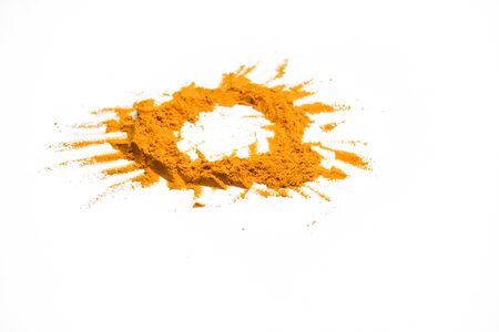 Turmeric powder isolated on white backgroundの写真素材