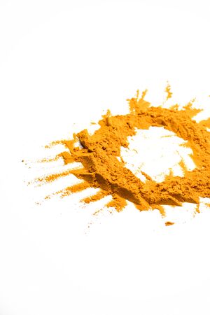Turmeric powder isolated on white backgroundの写真素材