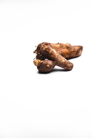 Fresh taro isolated on white backgroundの写真素材