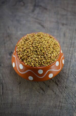 Fenugreek seeds in clay pot, Spice, Culinary ingredientの写真素材