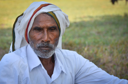 TIKAMGARH, MADHYA PRADESH, INDIA - NOVEMBER 01, 2019: Indian Village old man in traditional indian village dress.のeditorial素材