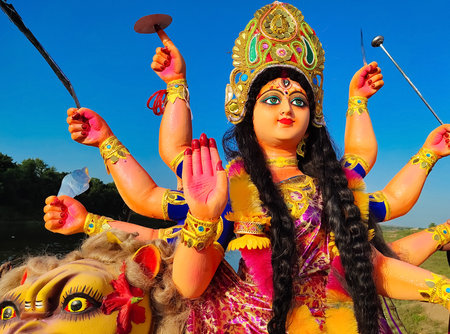 Closeup of face of Goddess Durga, Navratri, Hindu festival. Navratri is the biggest festival in...
