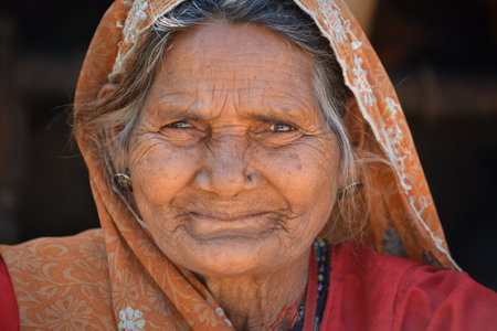 TIKAMGARH, MADHYA PRADESH, INDIA - FEBRUARY 03, 2020: Closeup portrait of an old indian woman at her village.のeditorial素材