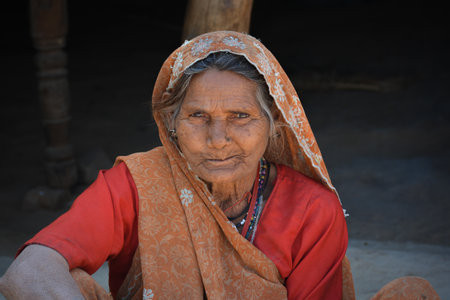 TIKAMGARH, MADHYA PRADESH, INDIA - FEBRUARY 03, 2020: Closeup portrait of an old indian woman at her village.のeditorial素材