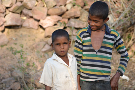 TIKAMGARH, MADHYA PRADESH, INDIA - MARCH 24, 2020: Happy rural Indian village boys.のeditorial素材