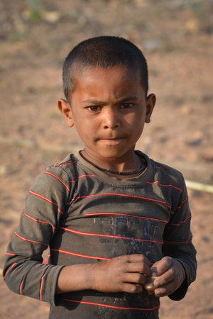 TIKAMGARH, MADHYA PRADESH, INDIA - MARCH 24, 2020: Portrait of unidentified Indian boy at their village.のeditorial素材