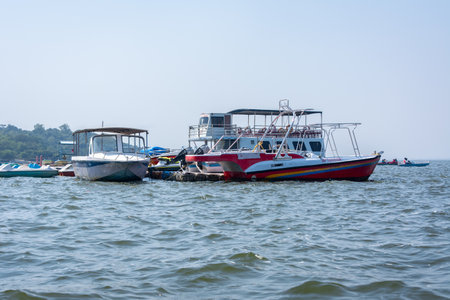 BHOPAL, MADHYA PRADESH, INDIA - NOVEMBER 26, 2021: Boats in the upper lake at Bhopal which is also known as 'city of lakes'.のeditorial素材