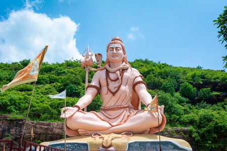 Hindu god Shiva sculpture sitting in meditation. Yoga and meditation concept.の写真素材
