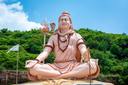 Hindu god Shiva sculpture sitting in meditation. Yoga and meditation concept.の写真素材