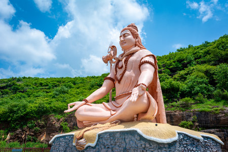 Hindu god Shiva sculpture sitting in meditation. Yoga and meditation concept.の写真素材