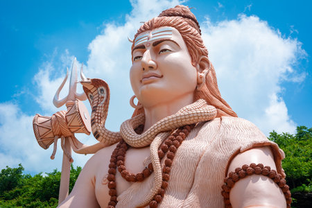 Hindu god Shiva sculpture sitting in meditation. Yoga and meditation concept.の写真素材
