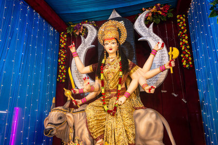 A beautiful idol of Maa Durga being worshipped at a pandal during Navratri. Navratri is biggest religious festival of Hinduismの写真素材