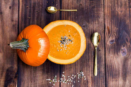 Pumpkin soup served in a hollowed pumpkins