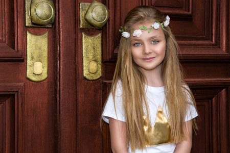 Kids fashion. Portrait of pretty little girl. Fashion portrait of beautiful little girl in fashionable clothing. Spring fashion.の写真素材