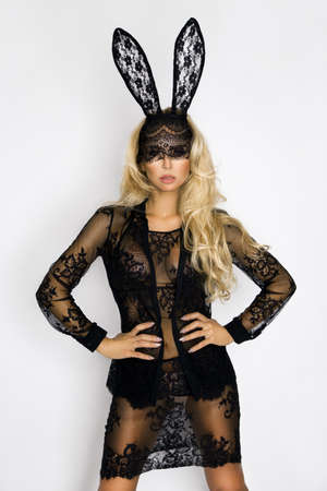 Sexy blonde girl with lace bunny ears. Lingerie model. Easter sexy bunny concept.の写真素材