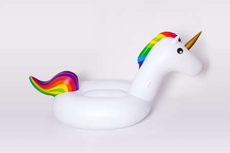 White, trendy, blown beach unicorn isolated on a white background. Hit the summer. Inflatable...