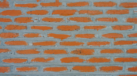 Background photo of red natural brick wall at baso shop, late afternoon in indonesiaの写真素材