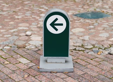 small one way sign at the museum brick roadの写真素材