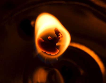 extreme close-up of the tealight candlewick with big snuffの写真素材